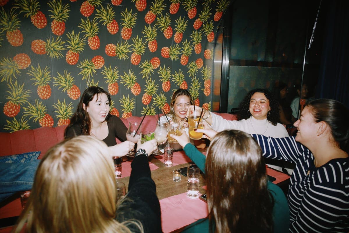 RealRoots members cheering happily together