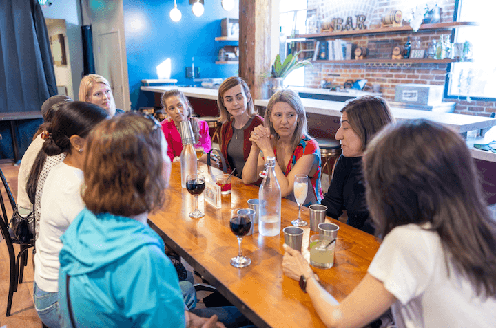 Women enjoying a RealRoots experience at a partner venue