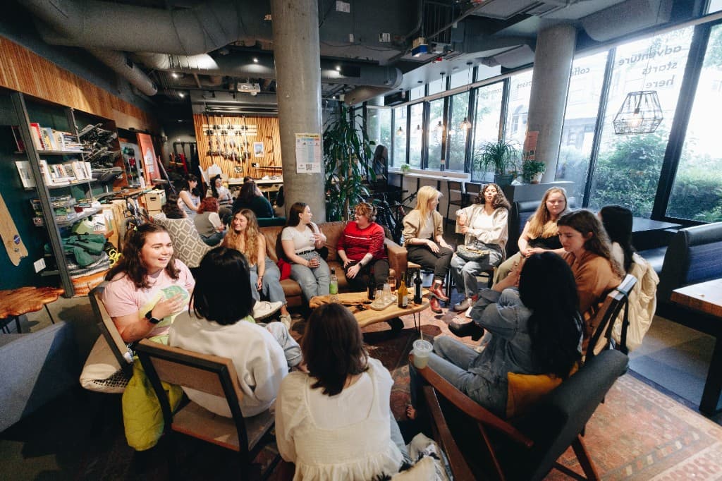 Women sitting in a circle during a RealRoots meet and greet