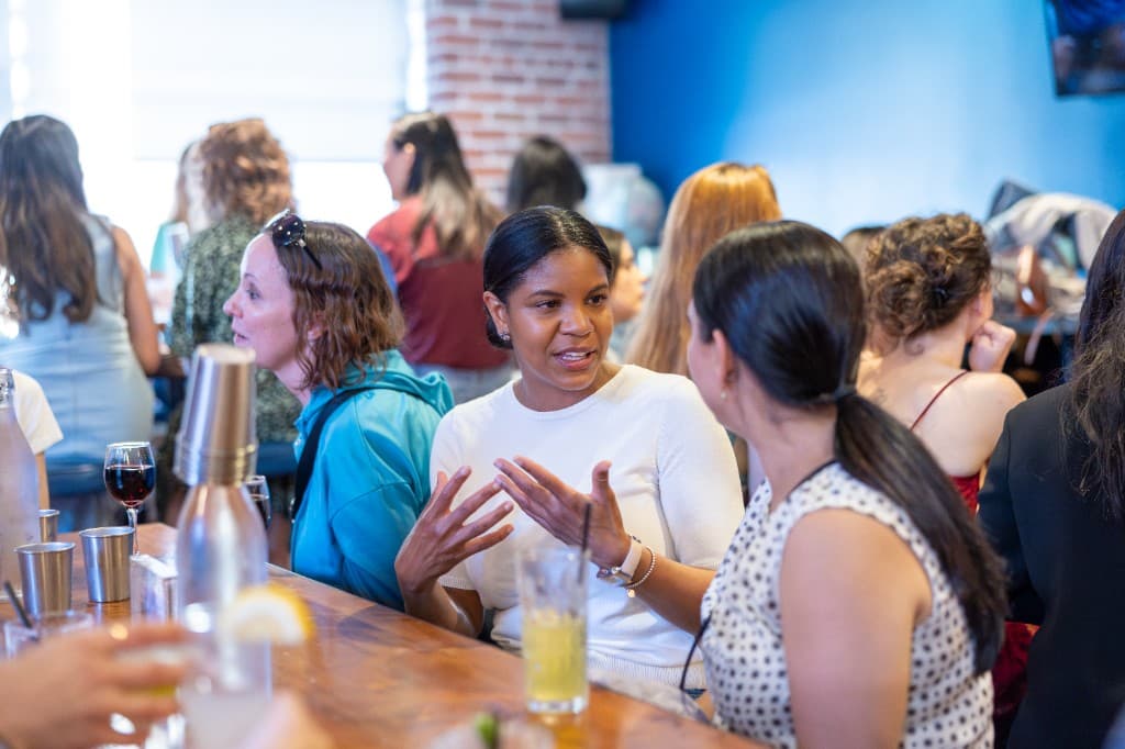 Women talking together at a RealRoots series experience